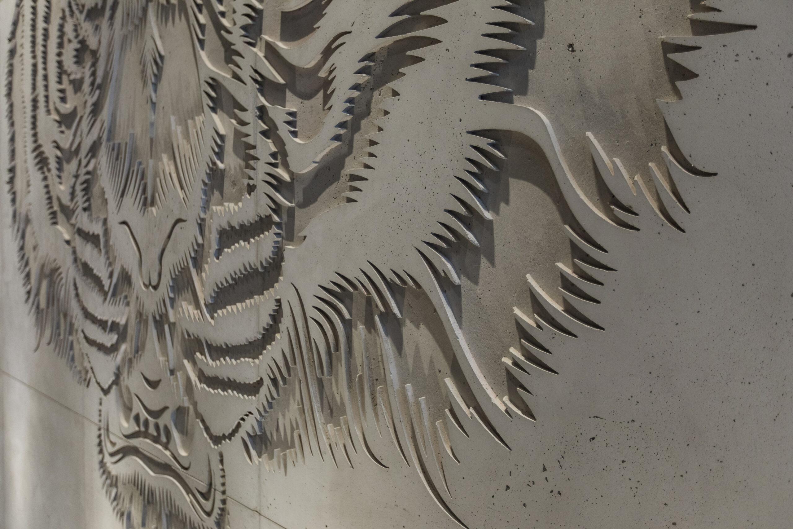 A close-up of a tiger inset design using Dekko’s lightweight concrete.